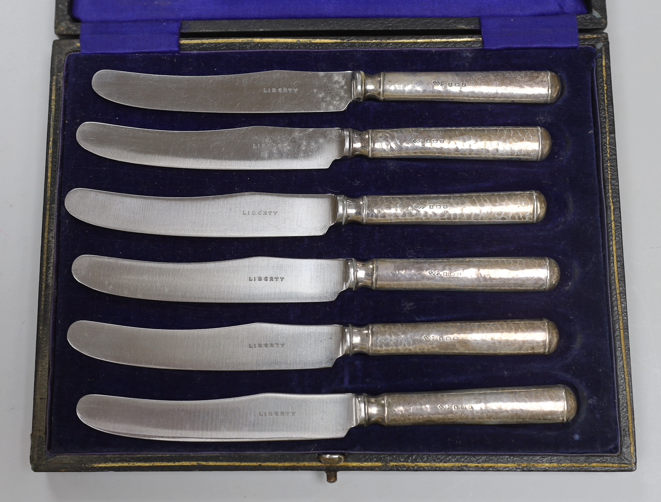 Six assorted cased sets of flatware including bean end coffee spoon, preserve spoons and spoon and pusher.